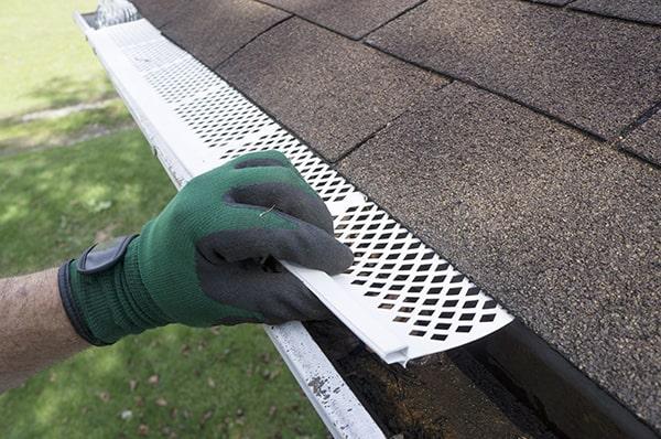 gutter guards are designed to cover the gutters and prevent animals and pests from entering and causing damage